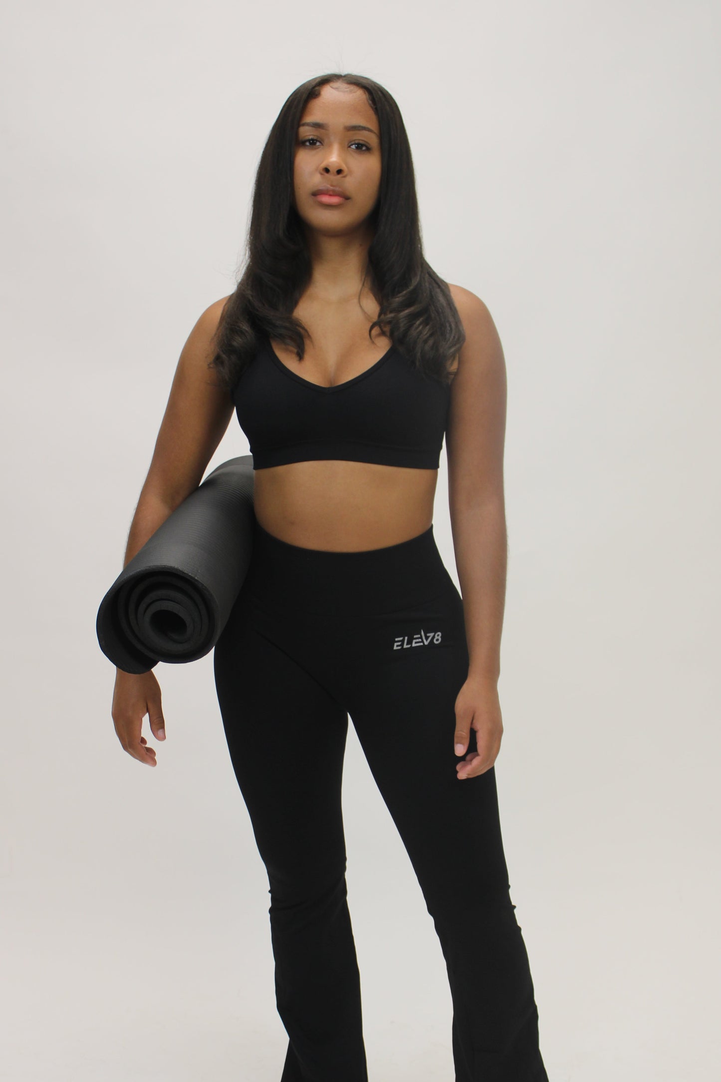 Black sports bra and flare pants set